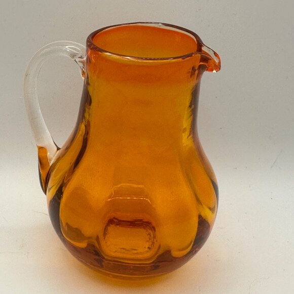 Unbranded hand blown orange with clear handle 3.5” miniature glass pitcher - Picture 2 of 5